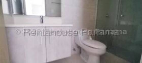 Modern bathroom with glass-enclosed shower and vanity in PH Mosaic Panama Pacifico