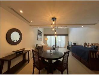 Open kitchen in loft apartment at Buenaventura with integrated cabinetry and appliances