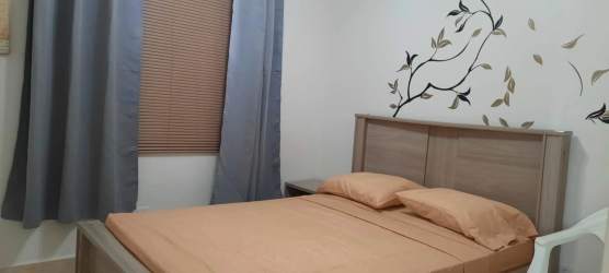 Minimalist bedroom with bed, window blinds, neutral colors Playa Dorada