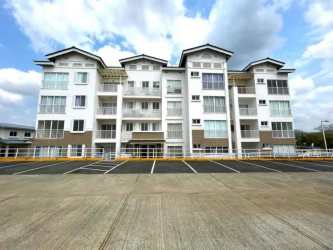 Modern bathroom with granite sink shower curtain at Playa Dorada Panama