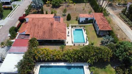 Overview of Punta Barco Village gated estate community with tropical landscaping Panama