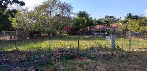Green flat cleared lot with fencing residential Coronado beach area Panama