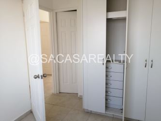 Minimalist bedroom with built-in closet rental house Arraiján Panama