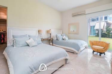 Modern bathroom design with glass enclosed shower in Bijao ground floor condo for sale Panama