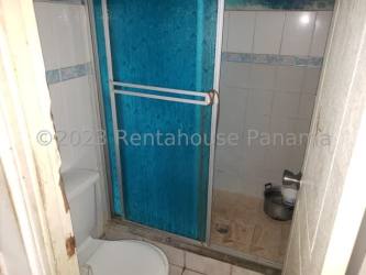 Simple bedroom with security bars in house for sale Vacamonte Panama