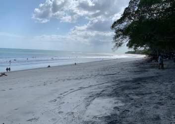 Wide sandy beach and ocean near San Jose Residences San Carlos Panama