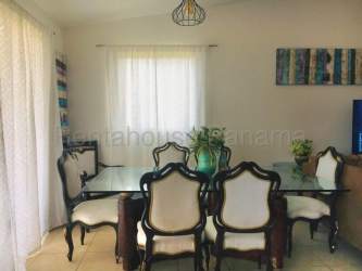 Modern children's playground at Residencial Los Pinos La Chorrera with slides and climbing