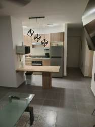 Swimming pool with sun deck in gated beach community Coronado Panama