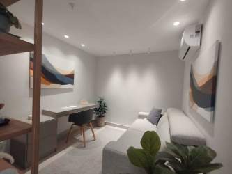 Minimalist home office or study with modern furnishings at PH Parterre Panama Pacifico