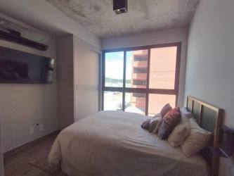 Outdoor terrace with bar counter and seating PH Centriqo Panama Pacifico