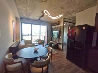 Bright contemporary living and dining room with balcony access PH Centriqo Panama Pacifico