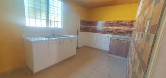 Bedroom with tiled floor and natural light in Panama