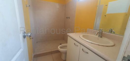 Bright kitchen with cabinets and window Panama house sale