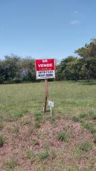 Gated brick entrance and security gate at Altos de Bejuco residential community Panama