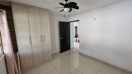 Bathroom with tiled walls, glass-enclosed shower and sink in house PH Spring Hills Costa Verde Panama