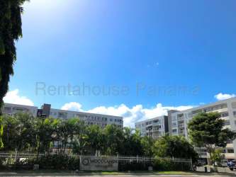 Modern multi-level residential building with landscaped gardens at PH Woodlands Panama Pacifico