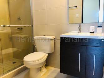 Modern bathroom with glass shower enclosure in PH Woodlands Panama Pacifico