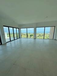Indoor dining space with panoramic view from Vista Mar penthouse apartment in Panama