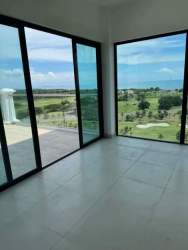 Spacious luxury bathroom with double sink vanity and glass-enclosed shower in penthouse Panama Vista Mar