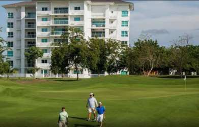 Aerial of beachfront resort with swimming pools, gardens and direct beach access in Bijao Panama