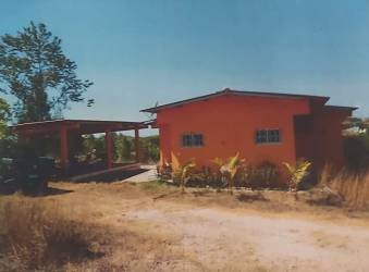 Minimalist bedroom with wooden bunk bed on countryside property for sale near beaches Panama