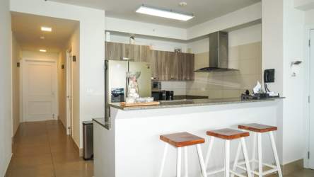 Spacious balcony with lounge chairs overlooking Pacific Ocean at PH Rio Mar San Carlos Panama