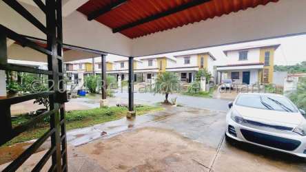 Open kitchen with granite counter and serving window at PH Greenland Arraiján Panama