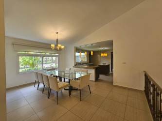 Kitchen with granite countertops and wood cabinets at PH Tucan Country Club Panama