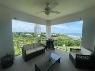 Outdoor balcony with grill furniture ocean scenery at Bijao Panama rental