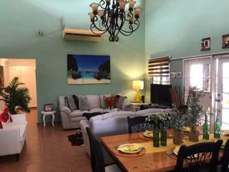 Bright bedroom with garden views and built-in closet in Coronado beach villa Los Jobos Panama