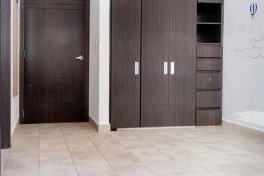 Bedroom with large window, natural light, built-in closet at Tucán Country Club Cocolí Panama