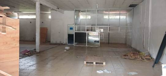 Partitioned glass office area inside warehouse with tiled flooring in Plaza Vista Alegre Arraiján Panama