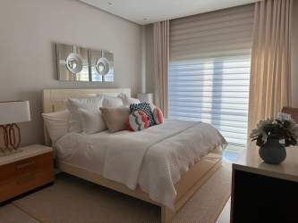 Fully equipped kitchen with tile finishes in luxury beachfront condo at Playa Escondida