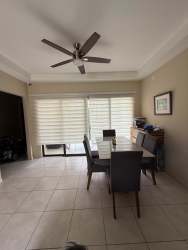 Open dining room with blinds and natural light rental Volcán Los Mandarinos