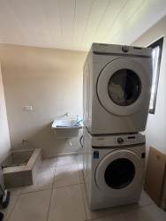 Laundry with washer dryer utility sink Volcán Los Mandarinos rental home