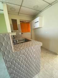 Compact tiled kitchen counter and sink simple design house Arraiján Panama