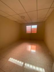 Second bedroom with tiles, window safety bars in house Arraiján for sale