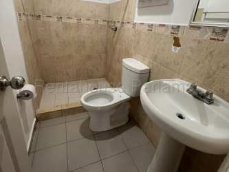 Bathroom featuring tiled walls, pedestal sink and shower in Monterregio rental