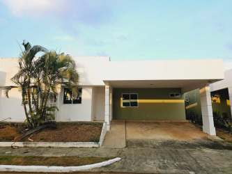 Bright open kitchen and living space with tile floors in PH Mirador del Mar