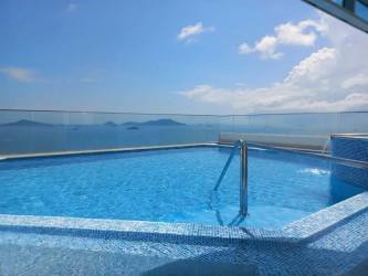 Open living dining marble floor access to terrace PH Casa Bonita Veracruz Panama