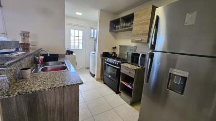 Family-friendly community water park and playground amenities at Playa Dorada Panama