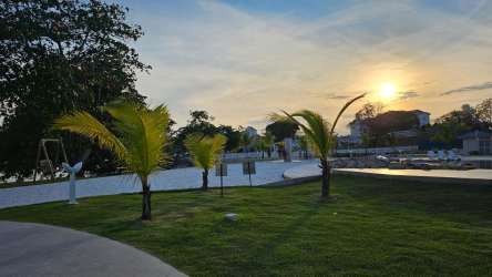 Compact open kitchen with breakfast bar granite countertop in Playa Dorada Vacamonte Panama