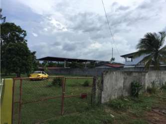 Satellite aerial view of residential neighborhood with outlined vacant lot for sale in El Coco La Chorrera Panama