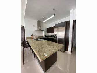 Bathroom with tiled walk-in shower and modern vanity PH Soleo Panama