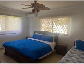Comfortable bedroom with closet, tiled floor, and natural light Coronado Panama beach house