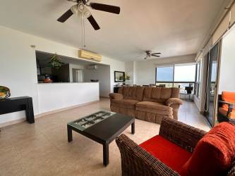 Kitchen with granite counters, stainless appliances, wood cabinetry Playa Gorgona Panama