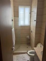 Master bedroom with Pacific ocean view, large windows in PH Bijao Residences Panama beach condo