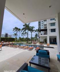 Master bedroom furnished with king bed, direct balcony access with stunning ocean views in PH Rio Mar Panama