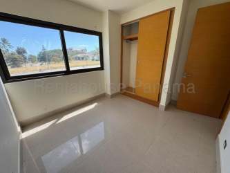 Spacious kitchen with ample cabinetry and granite counters Casamar Residences Panama beachfront condo