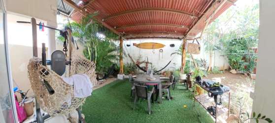 Bright kitchen with granite countertops, window, appliances in house for rent La Chorrera